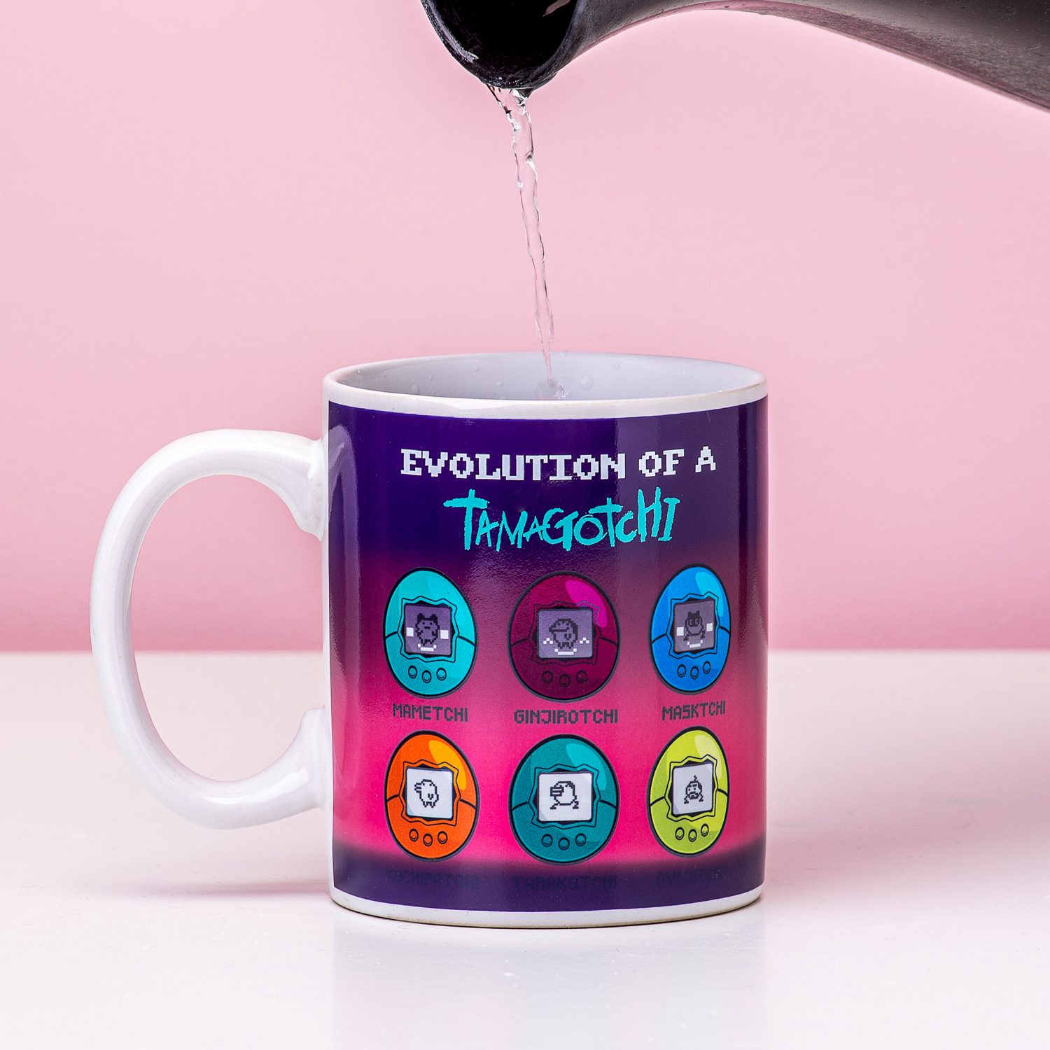 Tamagotchi Evolutie Warmtegevoelige Mok - Paladone